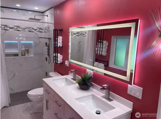 Heating/lighted mirror over vanity and radiant heated floor