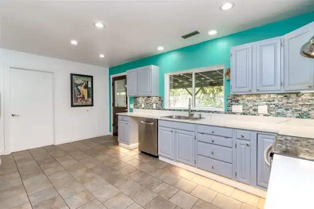 Expansive kitchen, note the toe-kick lighting!