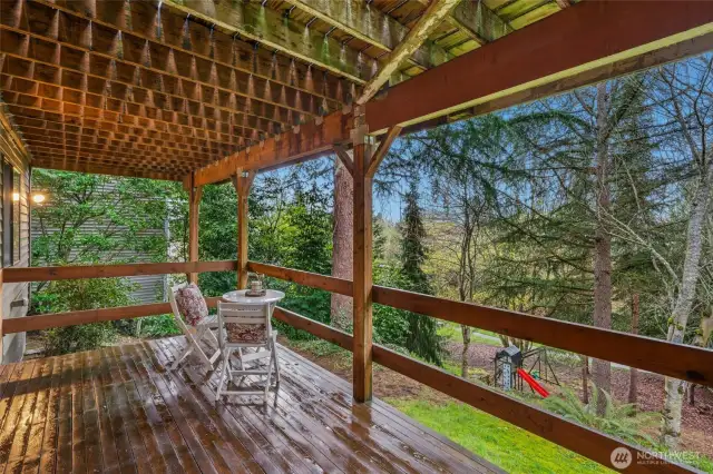 Enjoy your morning coffee or BBQ with guests on this roomy covered deck!