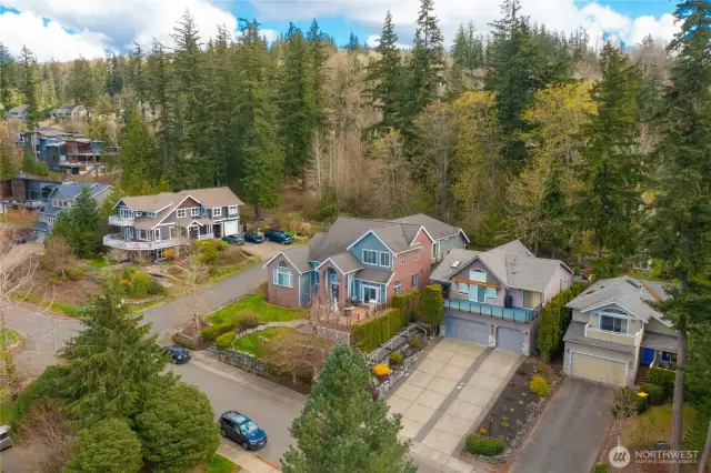 Perched between two beautiful homes in the much sought after Silver Beach Neighborhood and backing up to greenbelt, this beautiful home is what living in the Great NW is all about.