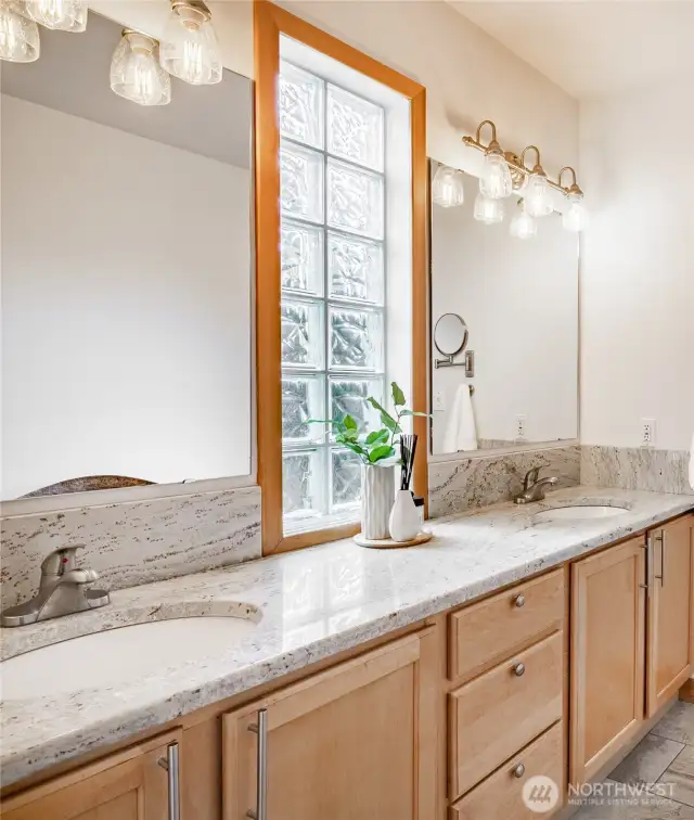Primary bath with plenty of storage.