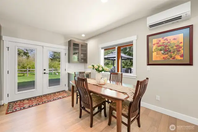 Downstairs dining area and wine fridge