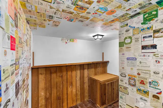 Wine cellar downstairs, yes those are cool wine labels on the wall