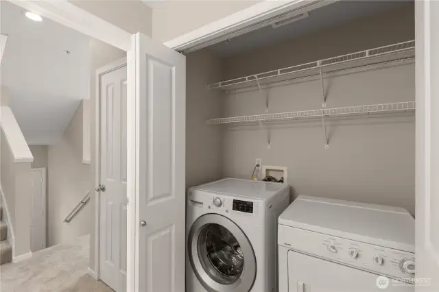 Side-by-side washer and dryer with upper shelf space for added storage and convenience