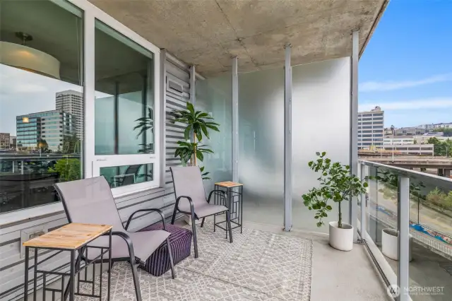The over-sized covered patio extends your living space and invites you to enjoy the urban ambiance.