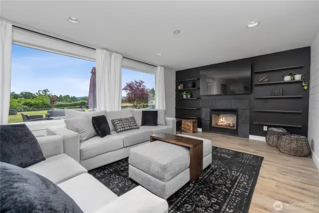 livingroom includes gas fireplace for cozy fall days