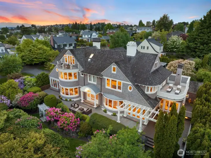 Prominently situated on a quarter acre lot in the city, this 1909 stately home is a private retreat minutes to all that Seattle has to offer