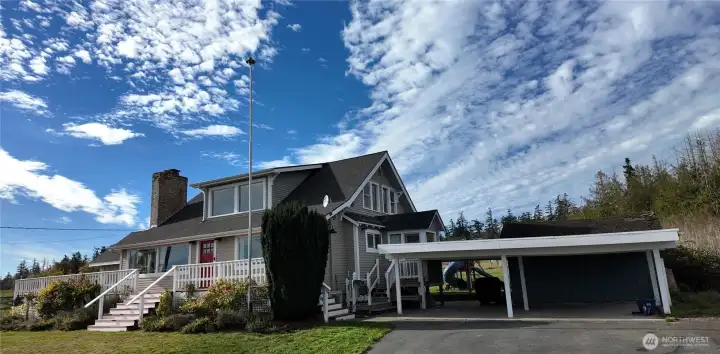 Double carport with storage building.