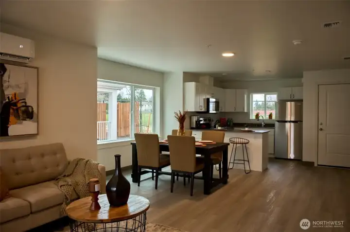 Staging is currently removed. Open concept with lots of windows and natural light.