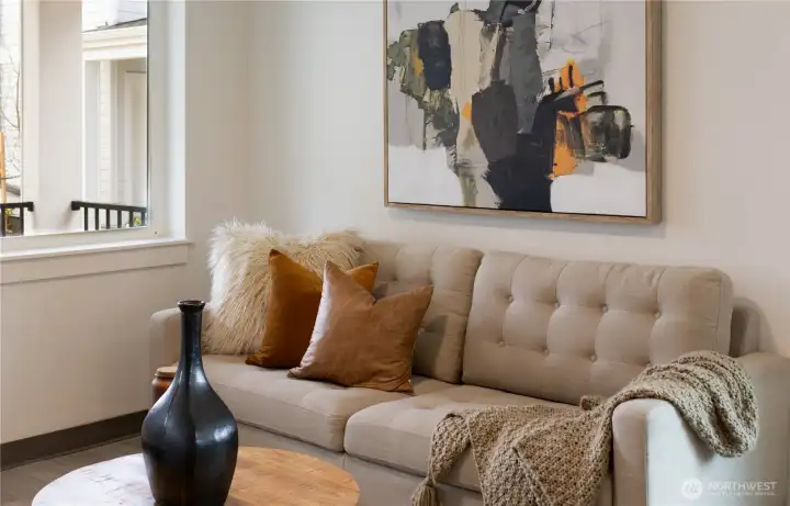 Staging is removed. Imagine yourself sitting in the living room looking out on the porch and courtyard.