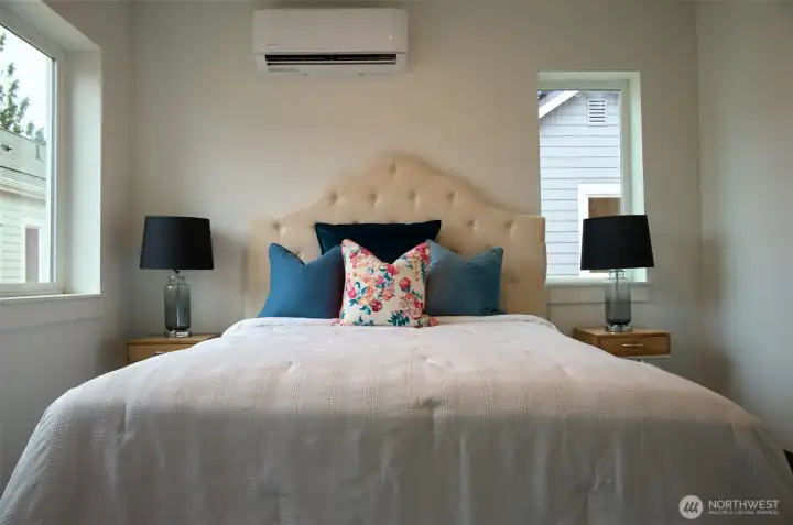 Primary bedroom on upper level.Staging is removed