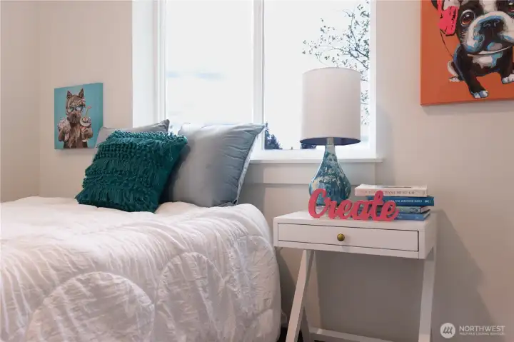 Room 2 on upper floor nice and bright. Staging is removed.