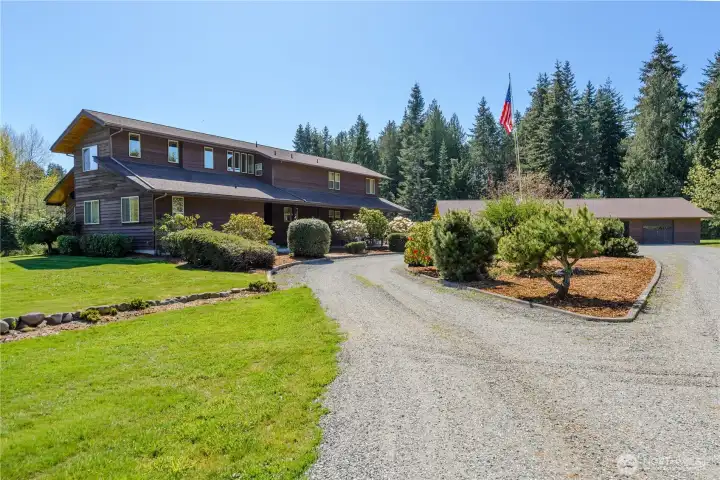 Entering your own private oasis on nearly 12 acres of pristine land