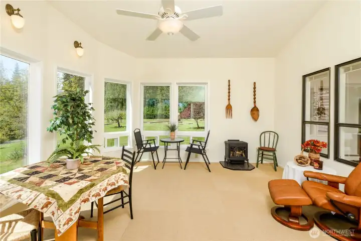 Sunroom addition with propane heat stone and fan