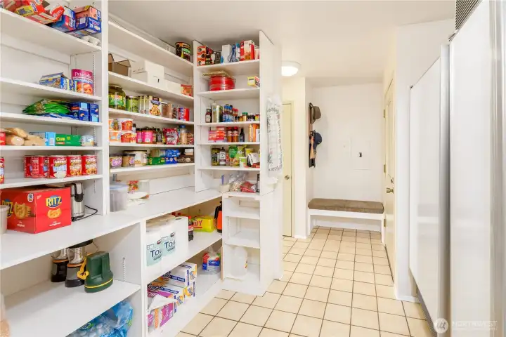 Massive pantry for all your goodies, and a "wet room" entry from the detached garage/shop