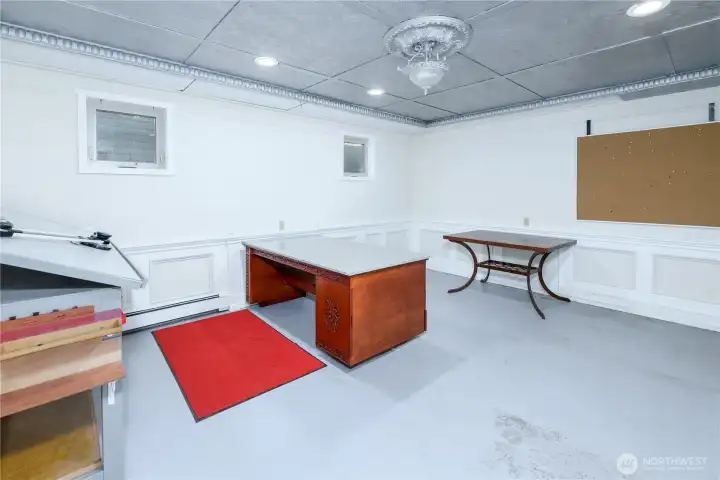Basement room set up to divide into 2 bedrooms.  Used as a bedroom and later as a office/drafting room