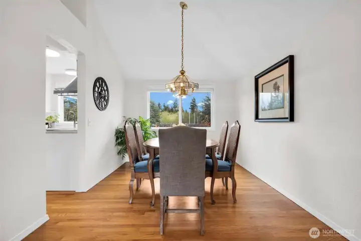 Formal Dining Room with vaulted ceilings