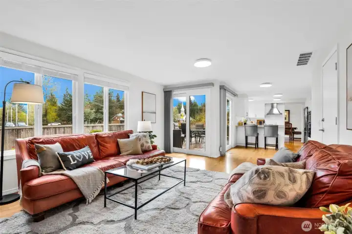 Expansive open concept casual living room with 2 slider door exit/entry for outdoor entertainment.