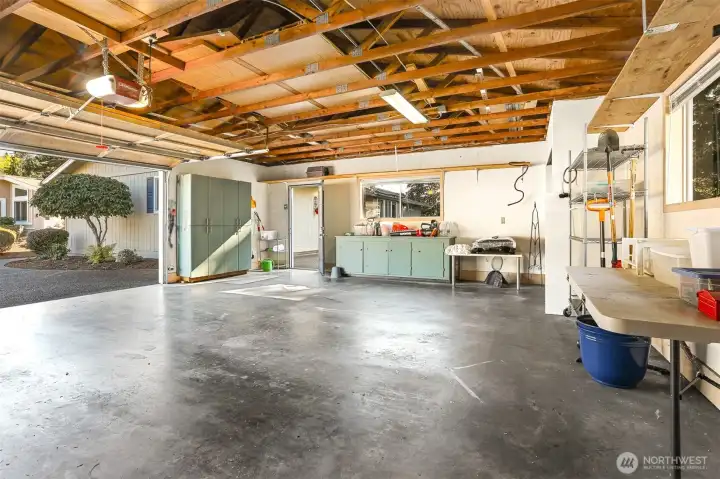 Detached 720 sq ft (Per SCR) two car garage and workshop.