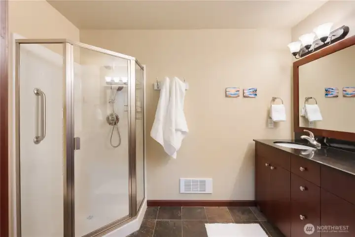 Primary bathroom with walk-in shower.