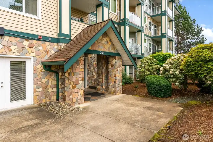 Landscaped entry into the condo building.