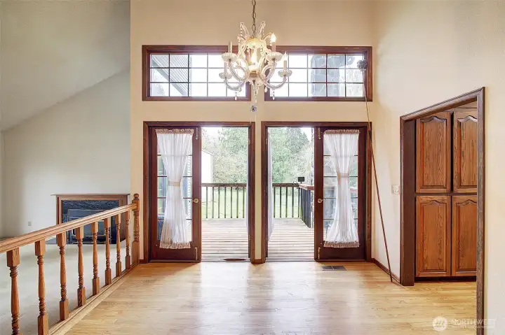 Dining room with deck through french doors