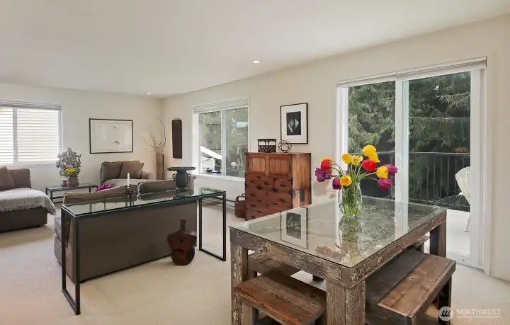 This home has a strong sense of warmth and light.  Plenty of windows! Enjoy views of that cedars that stand tall along the babbling creek.