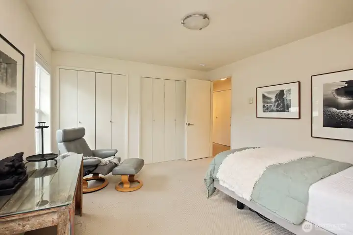 Your back is to the office. Two standard sized closets (straight ahead). The full bath is located in the hallway and to the right. The closet in the hallway (glimpsed through the open door) is where the washer & dryer are located.