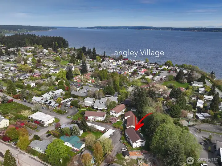 You can walk to Langley via a series of paths & sidewalks.