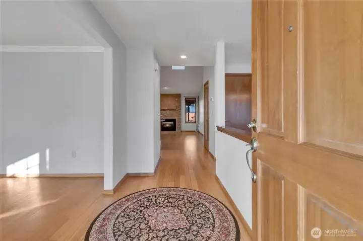 Wide open entry hall... notice the gorgeous bamboo hardwood flooring throughout most of the main floor!