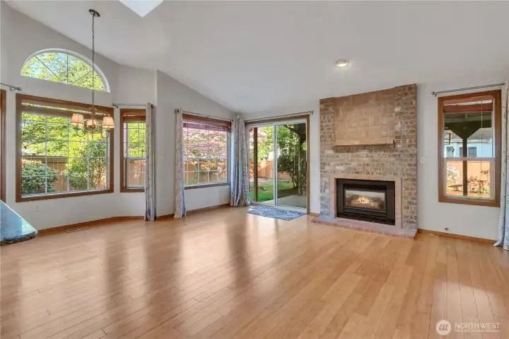 This is such a nice family room with vaulted ceilings, gas fireplace, and a slider to the huge covered deck for outside summer living!