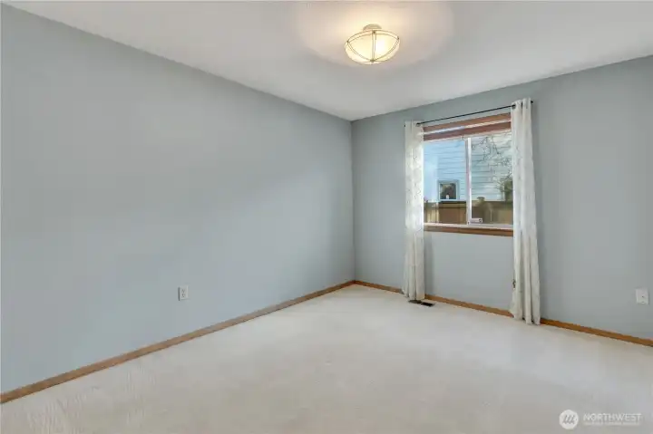 All the bedrooms are good-sized, like this 2nd bedroom.