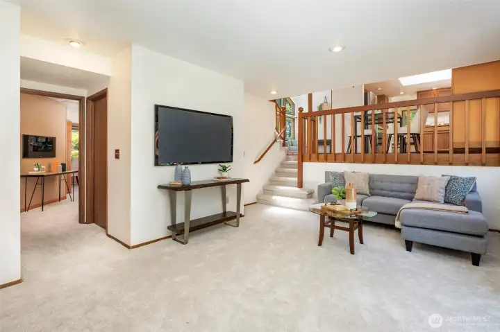 Large living room leads to rec rm + 4th bdrm