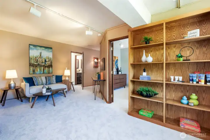 2nd view of rec room w/ bookshelves & entry to 4th bedroom