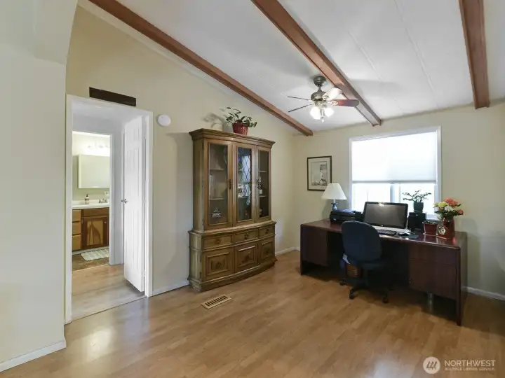 This area is off the living room near the kitchen, currently used as an office space, but option to use as flex space or dining area.