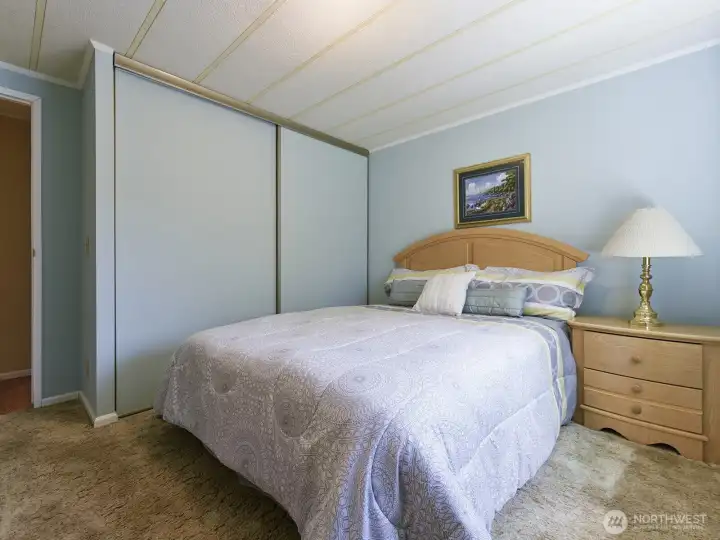 This is bedroom #2 and accommodates a queen size bedroom set.