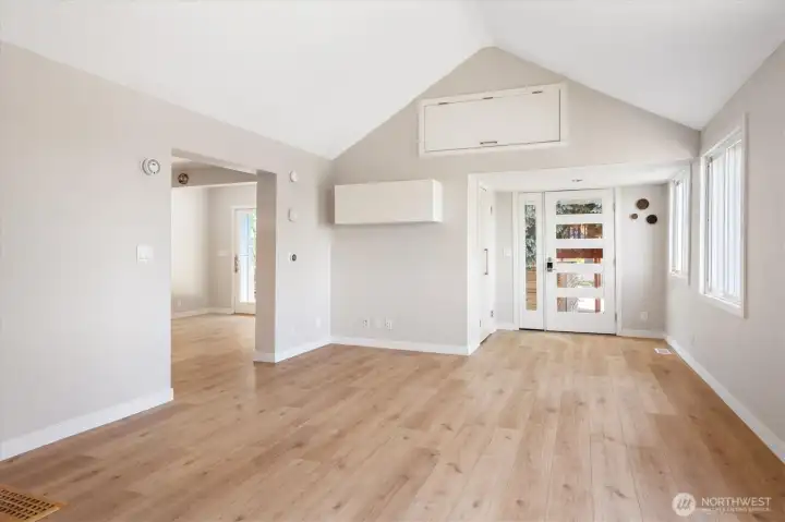 Additional Angle of Living Room Showcasing Shelving and Storage