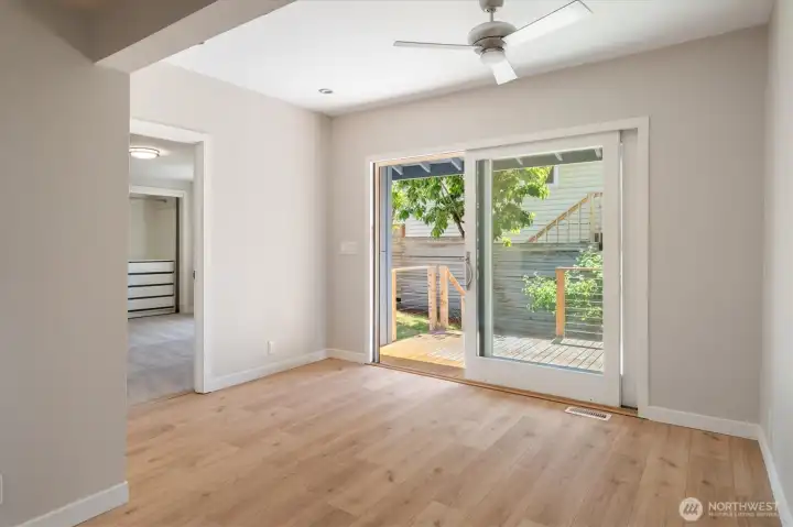 Additional Angle of Dining Room Showcasing Sliding Glass Door to Outer Terrace