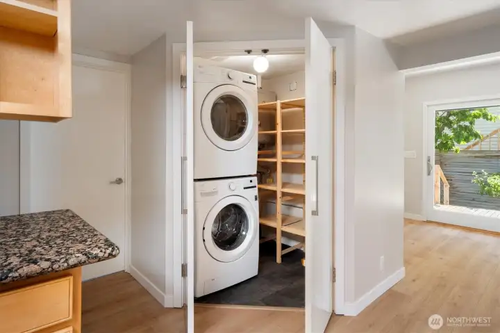 Utility Room Containing Washer, Dryer, and Tankless Water Heater