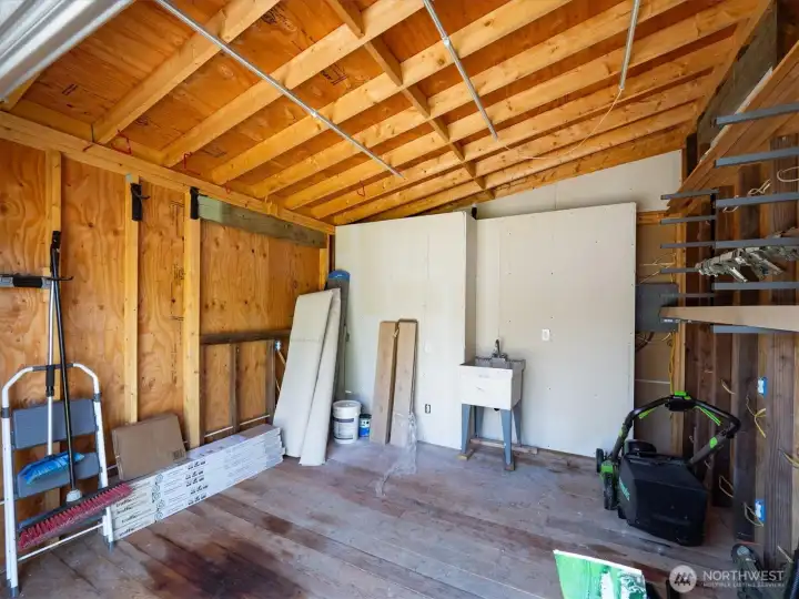 Small Garage Portion / Storage Area of Outbuilding with Power & Water