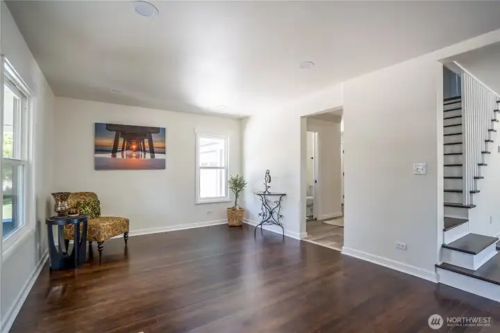 Large Living Room with refinished original wood floors