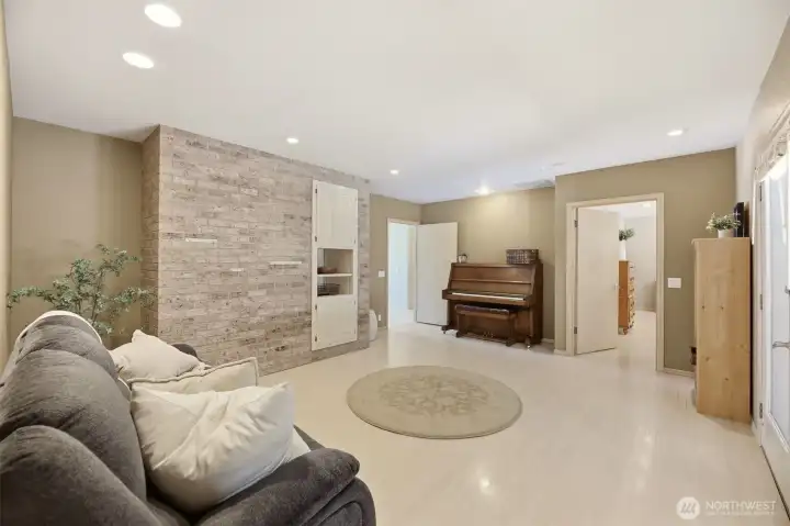 Family Room with French doors that lead to the covered deck and into the primary