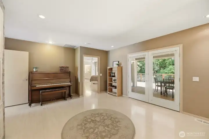 French doors from the family room to the outside covered deck