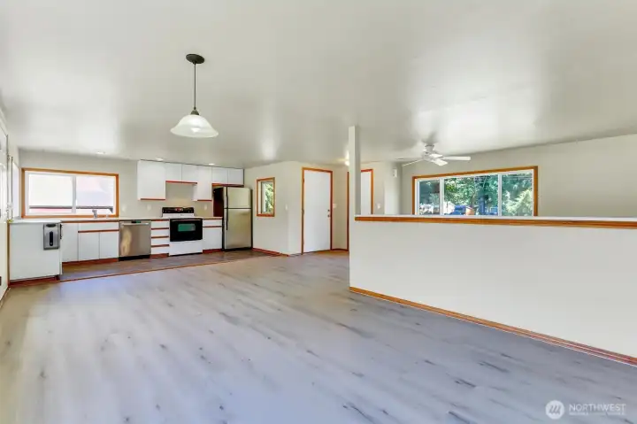 Another view of the dining area and the low wall between the dining room and living room.