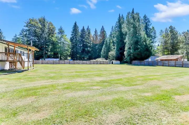 Expansive double flat lot totaling 3/4 of an acre.