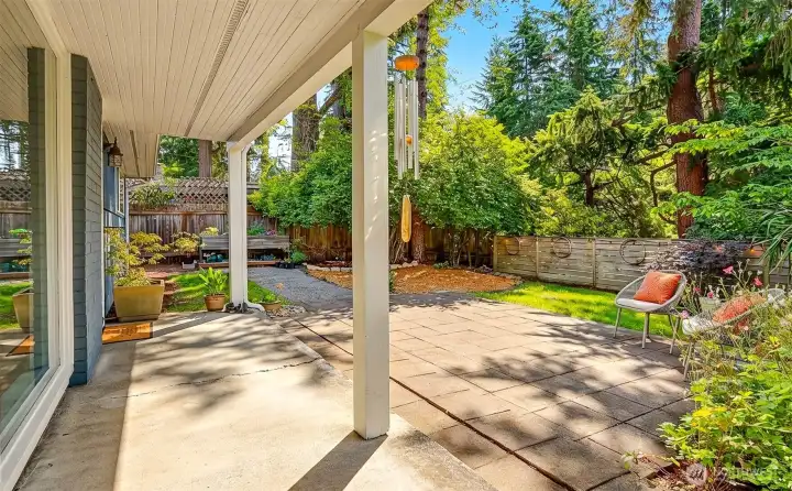 Covered front walkway and private yard. Covered front walkway and private yard.