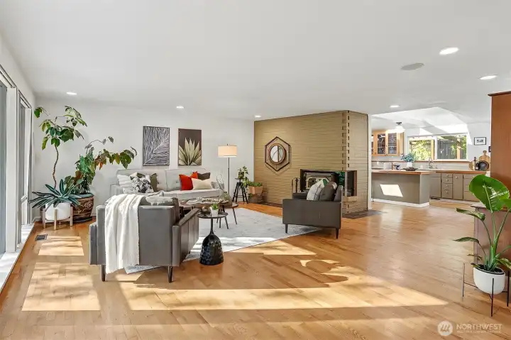 Beautiful oak floors flow into the dining room and kitchen area. Beautiful oak floors flow into the dining room and kitchen area.