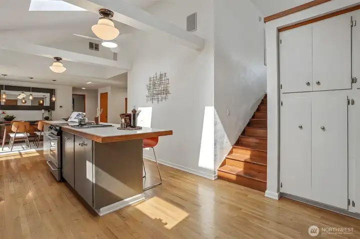 Stairs off the kitchen lead to the bonus room/loft area. Stairs off the kitchen lead to the bonus room/loft area.