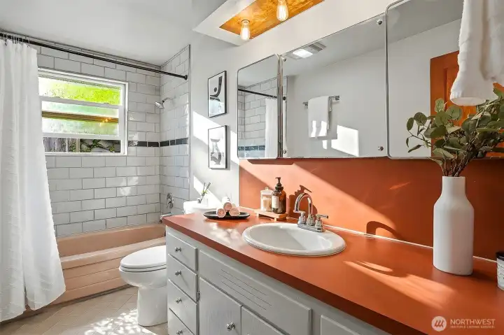 Bathroom with tub and shower. Bathroom with tub and shower.