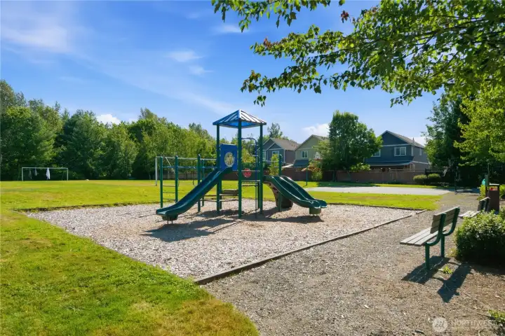 Community playground, soccer field & basketball hoop. Community playground, soccer field & basketball hoop.